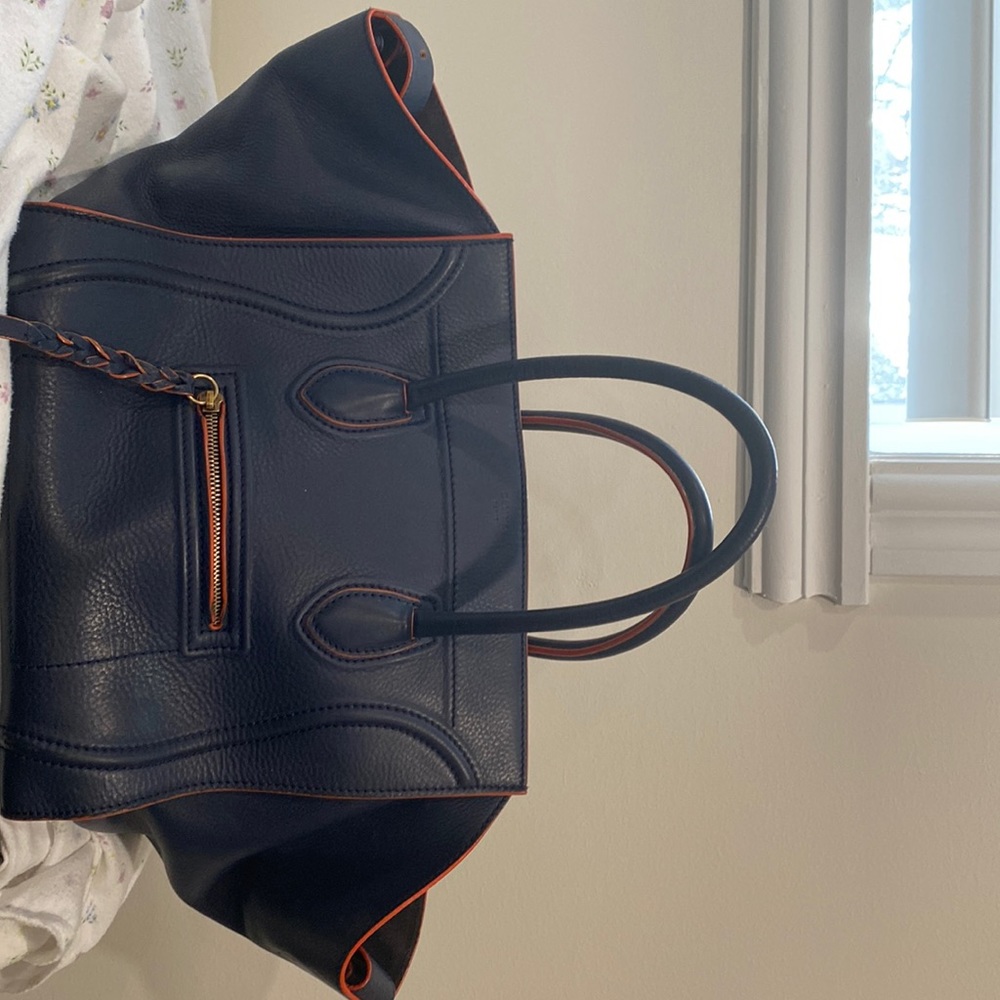 Celine navy blue leather medium phantom luggage tote.